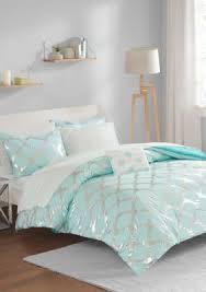 The aqua reef bedding collection features a delicate coral pattern in brilliant turquoise set against crisp white. Intelligent Design Lorna Complete Aqua Bed Set In 2021 Aqua Bedding Bedding Sets Beach Bedding Sets