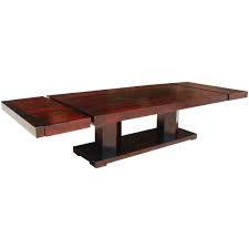 A traditional dining table set inspired by the farmhouse antique furniture look. Extra Large Solid Wood Double Pedestal Extendable Dining Table For 12