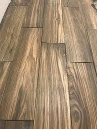 Wood Tile Floors All The Rage Right Now You Love Them That Means We Can Do Them Flooring Wood Tile Wood Tile Floors