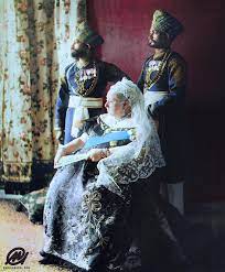 Queen victoria was not only flattered by the attention of ahmad, she was also influenced by his ideas. Queen Victoria Seated With Her Two Indian Servants Mustafa And Chidda Standing Behind Her In Full Uniform With Medals Colorizedhistory