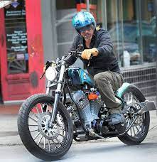 Brad Pitt Takes His Motorcycle For A Nola Spin While The Kids Play With Jacques Motorcycle Motorbikes Motorcycle Culture
