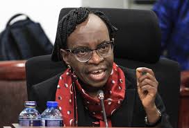 Sewing diplomacy? Ambassador McCarter buys Kenyan print shirt