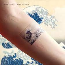 Hiroe nirei discusses some of the studies written about the iconic image. Hokusai S The Great Wave Off Kanagawa Temporary Tattoo Set Of 2 Waves Tattoo Tattoo Set Japanese Tattoo