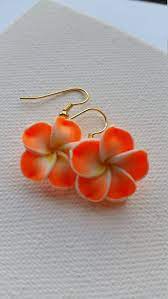 Valid through 12/31/21 at www.worldmarket.com. Orange Flower Earrings Orange Earrings Plumeria Earrings Etsy Flower Earrings Etsy Earrings Orange Earrings