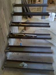 Wooden cantilever staircase plated with stainless steel composed of beech wood steps plated with a 2 mm satinised stainless steel plate with no visible welds. Timber Springs Lodge Floating Stair Update Stairs Floating Stairs Cantilever Stairs