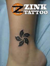 Only 1 available and it's in 1 person's cart. Tattoo Of The Hong Kong Flower On My Ankle In Brown To Symbolize My Time Living There And The Place Where I Found Harmon Tattoos Tiny Tattoos Hong Kong Tattoo