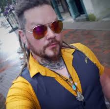 Motorcyclist riding through stoplight