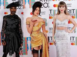 On occasion a skirt or a dress is simply too short to appear appropriate unless you're wearing leggings under it. Brits 2021 From Dua Lipa S Statement Suspenders To Olivia Rodrigo S Neon Prom Dress The Six Biggest Fashion Moments The Independent