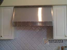 If a range vent hood is too tall to fit, you can't fudge it. Zinc Hood Vent With Dark Patina Clear Coated With A Dark Tint Stainless Steel Hood Vent Stainless Steel Hood Hood Vent Cover