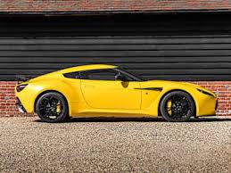 Image result for Sunburst Yellow 2012 Aston Martin