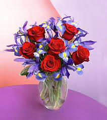 Wedding bouquet is one of the main and significant accessories for any bride. Janousek Florist Roses Iris Red Rose Bouquet F604