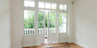 hout openslaande tuindeuren terrasdeuren bovenlicht zijlicht doors and floors cottage renovation french doors patio