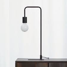 Or, give yourself task lighting in the home office with a desk lamp. Arc Black Table Lamp Reviews Cb2