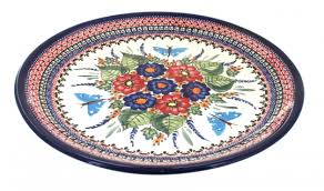 The burst of blossoms at the center of this stoneware collection is reminiscent of traditional designs, yet the lightly striated solid white portions of the coupe shaped. Blue Rose Polish Pottery Floral Butterfly Large Round Platter