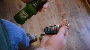 Gently (gently being the key word, otherwise you'll end up wearing beer) lever up the edge of the cap. Open Bottle Caps With Keys Lighter Butter Knife Etc Youtube