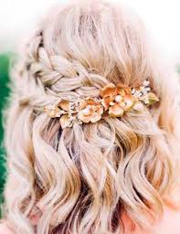 The hair has been loosely curled and there is a cute fishtail braid on the side of her head. 20 Stunning Diy Prom Hairstyles For Short Hair