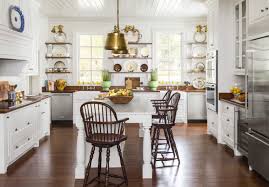 The wood used on this one, however, has a bit more red undertone, giving it a slight purplish tinge, which helps the white cabinets stand out just as well as the wengue floors. 16 Best White Kitchen Cabinet Paints Painting Cabinets White