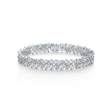 Inspired by the fire of our superlative diamonds, tiffany victoria® designs are intricately handcrafted with a unique combination of cuts. Tiffany Victoria Vine Tennis Bracelet In Platinum With Diamonds Tiffany Co