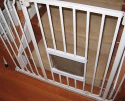 This gate designed by the diy hubs offers a solution if you also own a cat. Cat Flap In A Baby Gate Cat Door Cat Door Diy Cat Flap