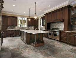 For high contrast with the golden yellow tones of oak furniture use a deep shade of the. 17 Flooring Options For Dark Kitchen Cabinets Kitchen Tiles Design Luxury Kitchen Design Traditional Kitchen Cabinets
