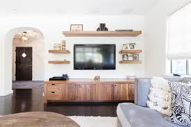 The Ultimate Guide To Decorating A Tv Wall Jessica Devlin Design The unique sliding doors on this tv stand are sure to spice up any living white floating tv wall unit with shelves: jessica devlin design