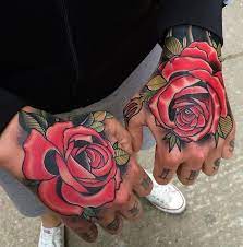 Oftentimes, the color of the rose is considered to be just as important to its meaning. Red Roses Hand Tattoo Best Tattoo Ideas Designs Rose Tattoos For Men Rose Hand Tattoo Tattoos