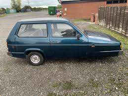 Image result for Racing Yellow 1994 Reliant