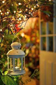 Here Are Outdoor Lighting Ideas For Your Yard To Help You Create The Perfect Nighttime Entertaining Space Out Candle Lanterns Lantern Lights Backyard Lighting