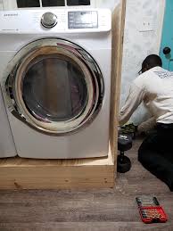 A hardworking laundry room centered around a pair of smart, efficient appliances makes life easier, but at a cost. Diy Laundry Pedestal And Countertop Stacie S Spaces