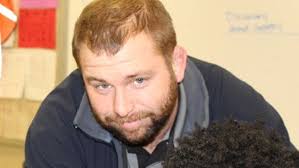 Shocked:' Community defends Soddy Daisy High wrestling coach amid criminal  investigation