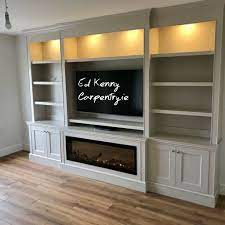 Sometimes modern fireplaces are still situated centrally, beneath a television set, but be sure to. Bespoke Tv Fire Unit Feature Wall Living Room Built In Shelves Living Room Living Room Units