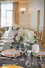 This Table Setting On A Grey Rectangle Table At The River Crest Country Club In Fort W Table Flower Arrangements White Flower Arrangements White Table Settings