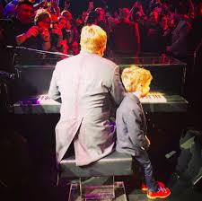 David and sir elton have two children, both of whom were born through a surrogate. Elton John Posts Rare Photo Of Son Elijah On Stage Hello