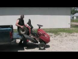 When your mower weighs over 500 pounds, you're going to drive it everywhere it goes. Loading The Mower No Ramps Of Course Youtube