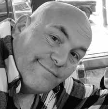 The button to the right of the gas pedal is that the dimmer switch for the  headlights ?