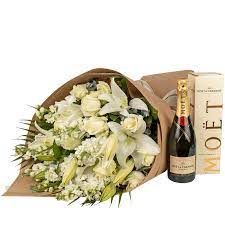 But some rural cities within auckland may be charged for their delivery. Lavish White Bouquet With Moet Free Flower Wine Delivery Auckland