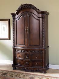 1 459 99 Millennium By Ashley North Shore Armoire B553 49b 49t A Rich Traditional Design And Exquisite Details Come T Shore Bedroom Armoire Ashley Furniture