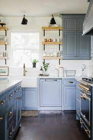 Easily change up the look of your kitchen. Blue Kitchen Cabinets With Black French Stove Cottage Kitchen