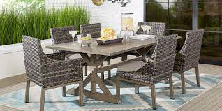 Outfitted with beautiful walnut or ash legs, a sleek metal frame, and ceramic, melamine resin, or glass top, this stunning design is perfect for a contemporary dining room. Outdoor 9 Piece Patio Dining Sets
