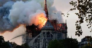 Connected letters w+o+w in a blue tray. The Notre Dame Cathedral In Paris Is On Fire