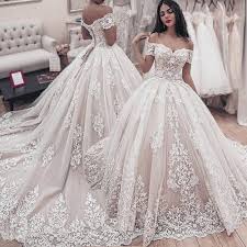 Elegant champagne bridal wedding dresses 2020 ball gown scoop neck sleeveless backless glitter tulle beading sequins cathedral train ruffle. Off The Shoulder Lace Applique Ball Gown Wedding Dresses 2020 Short Sleeve Boho Elegant Chapel Train Bridal Gown In 2020 Dubai Wedding Dress Ball Gowns Wedding Short Sleeve Wedding Dress