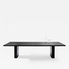 Constructed with select veneers and hardwood solids; Dining Tables Carlyle Collective