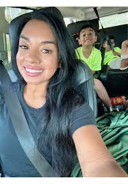 Little Boy Singing with Mom in A Truck