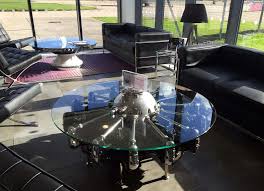Stylish and sleek coffee table with glass top and a chrome colored metal base, this chic coffee table looks great with every kind of furniture, perfect for you afternoon coffee breaks while working. Aircraft Furniture At Marshall Aviation S Office In The Uk