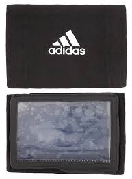 Catcher wears a wristband that can accept a play card. Adidas Football Wrist Coach