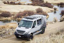 Custom Camper Van Merges Sleek Design With Space For Gear Custom Camper Vans Sprinter Van Camper Custom Campers