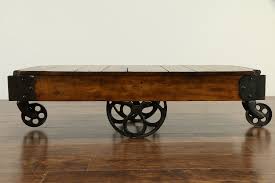 Baxton studio reine rustic industrial style antique black textured finished metal distressed wood occasional cocktail coffee table. Sold Industrial Salvage Antique Railroad Ash Iron Cart Coffee Table Lawson 33127 Harp Gallery Antiques Furniture