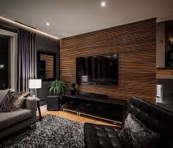 Wooden Striped Feature Wall Black Leather Sofa Grey Sofa Black Cabinet In 2020 Modern Living Room Black Accent Walls In Living Room Living Room Tv Wall