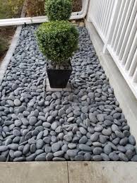 Much better prices even if not buying in bulk. 3 In To 5 In 30 Lb Mexican Beach Pebbles Fromhome Depot Landscaping With Rocks Front House Landscaping Front Yard Landscaping Design