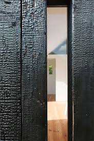 Extension Bois Par Niney Et Marca Architectes A Ambon 56 France Bois Brule Facade Bois Construction Bois